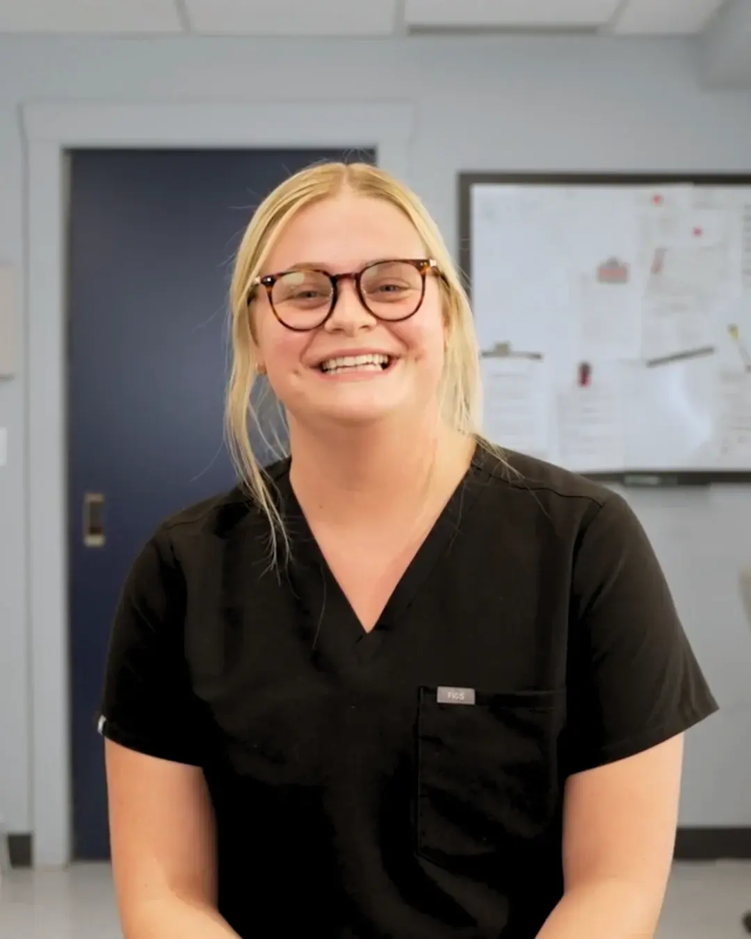 Claire Bougher, nurse, in scrubs at her clinic
